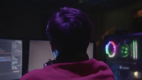 Game Developer or Programmer Developing Code on Computer at Desk Stock Footage 234140508
