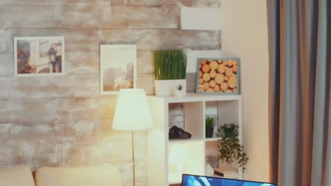 Game developer testing new joystick for shooter game Stock Footage 125176831