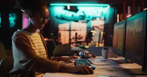Game Developer Working on Computer in Office Stock Footage 251820351