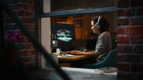 Game Developer Works On Her Computer Stock Footage 197421839