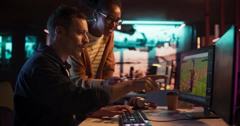 Game Developers Working on Computer in Office Stock Footage 251820552