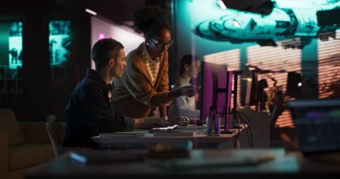 Game Developers Working on Computer in Office Stock Footage 251820626