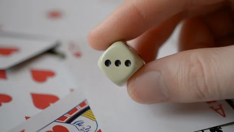 Game dice dice on playing cards Stock Footage 119241490