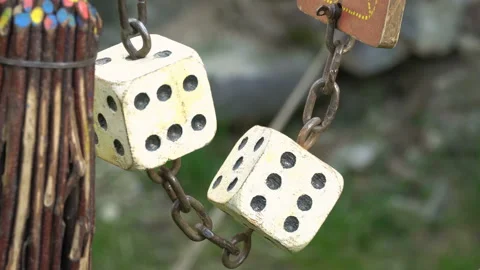 Game dice fastened with chain - horror game.  Stock Footage 106434820