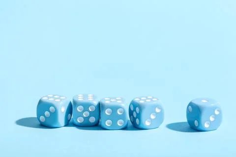 Game dices on blue background Stock Photos