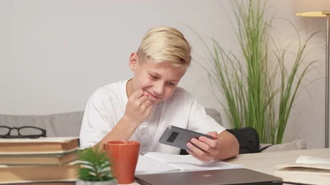 Game failure upset schoolboy mobile addiction Stock Footage 232720275