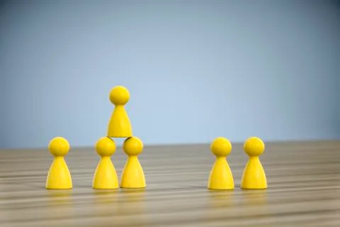 Game figures building a pyramid Stock Illustration
