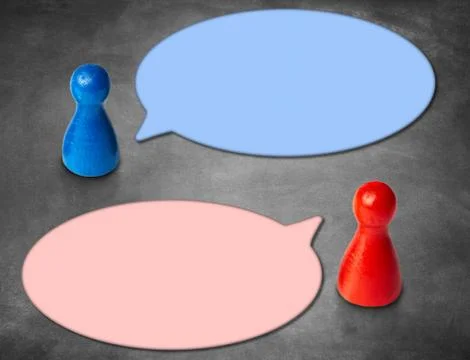 Game figures with round speech bubbles with blackboard backgroun Stock Photos