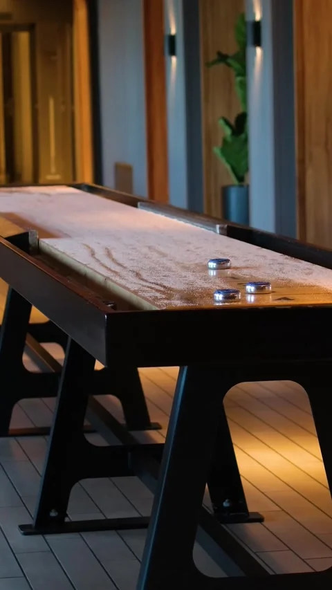 Game Of Indoor Tabletop Shuffleboard Stock Footage 316075925