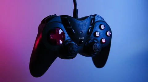 Game joystick, gamepad. blue red backlight. cyberpunk photo Stock Photos