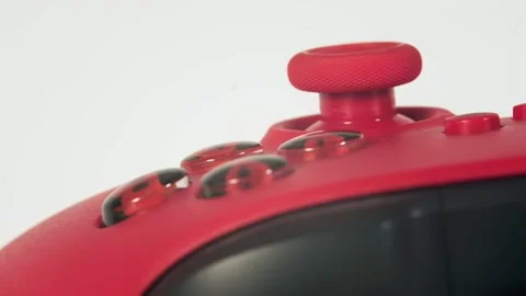 Game joystick, red joystick for game console, close-up, macro shooting Stock Footage 262155238