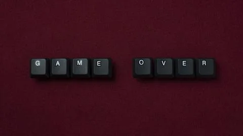 Game Over Failure Concept With Keyboard Keys On Red Background Stock Photos