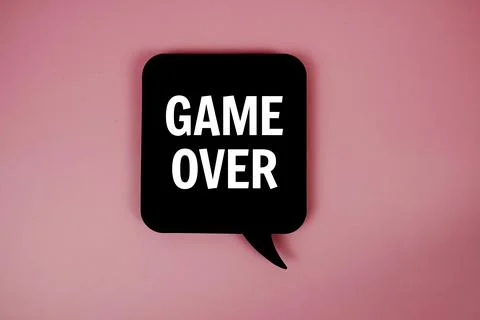 Game Over text with speech bubble top view on pink background Foto stock