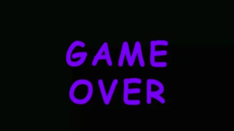 Game Over text with swirling neon effects during a digital failure sequence.. Stock Footage 343413179
