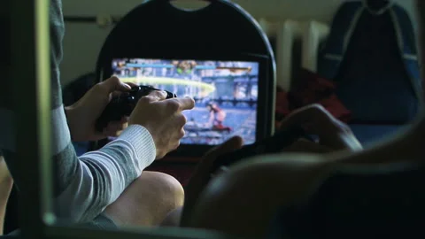 Game pad black playing game hold hands close up Stock Footage 108627567