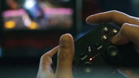 Game pad black playing game hold hands close up Stock Footage 108630034