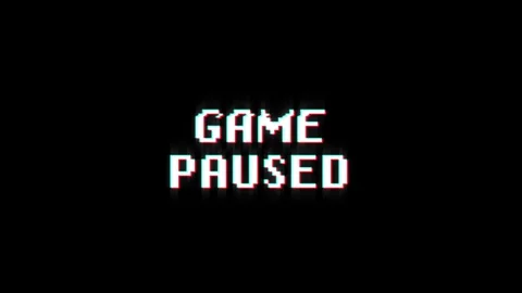 Game paused 8-bit text pixel dynamic glitch animation video game effect Stock Footage 313076010