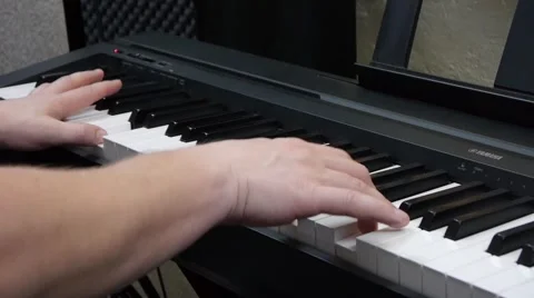 Game on the piano.Close-up Video stock 64274777