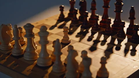 Game pieces standing chessboard closeup. Figures show tactical power in sunlight Stock Footage 332336946
