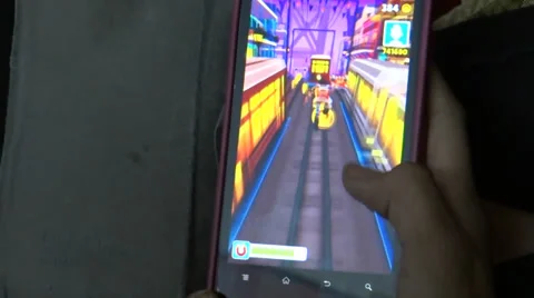 Game playing on mobile phone closeup Stock Footage 32679228