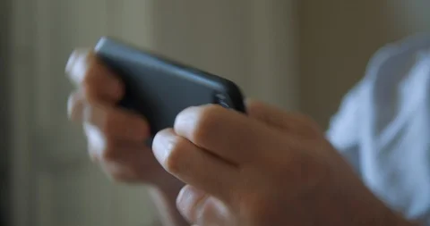 Game playing on smartphone Stock Footage 106367395
