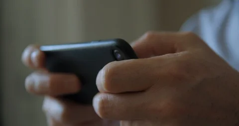 Game playing on smartphone Stock Footage 106367444