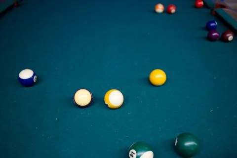 Game of Pool on a green pool table Stock Photos