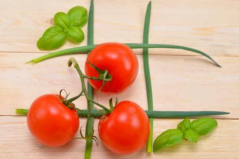 Game of tic-tac-toe from vegetables close-up Stock Photos