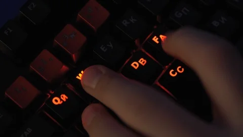 Game Using Keyboard. Male Hacker Breaks into System. Stock Footage 125344698