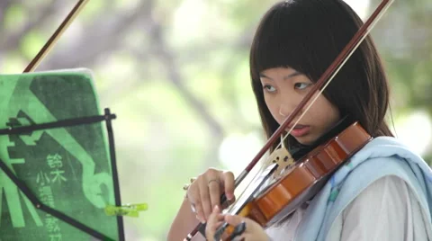 Game on a violin Stock Footage