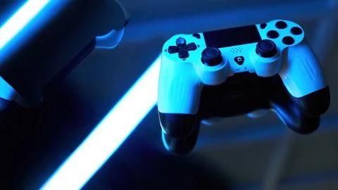 Gamepad on abstract background with light effects Stock Photos