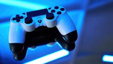 Gamepad on abstract background with light effects Stock Photos