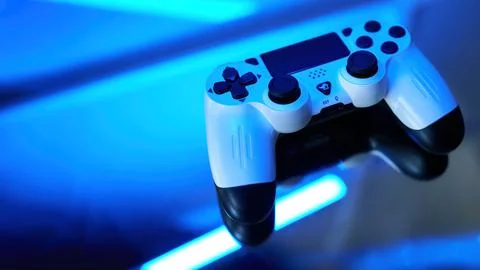 Gamepad on abstract background with light effects Foto stock