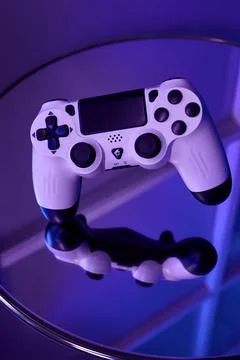 Gamepad on abstract background with light effects Stock Photos