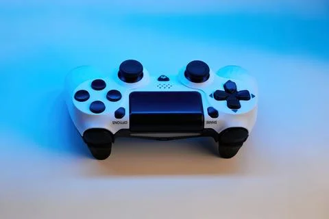 Gamepad on abstract background with light effects Foto stock