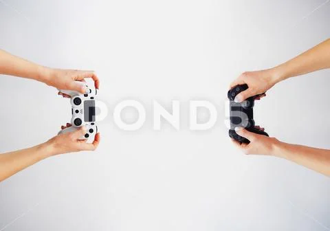 Gamepad in hand. Video games. Gamer. Game contest Stock Photos