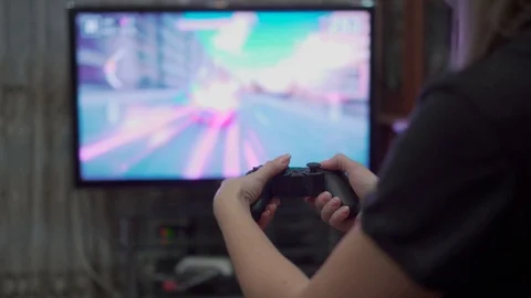 Gamepad in the hands in front of the screen Stock Footage 119911252