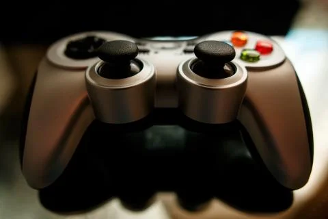 Gamepad on the mirror Stock Photos