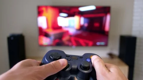 Gamepad in the player's hands Stock Footage 81800867