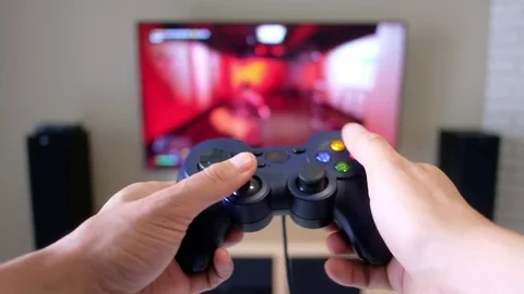 Gamepad in the player's hands 스톡 동영상 81800883
