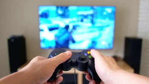 Gamepad in the player's hands 스톡 동영상 82034777