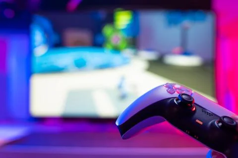 Gamepad on a technological background. Video game gadget. Modern digital tech Stock Photos