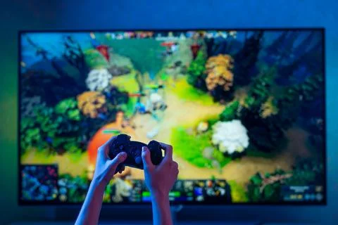 Gamepad on TV background Stock Photos