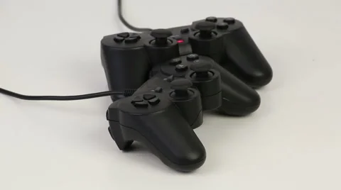 Gamepads on a white background Stock Footage 59519496