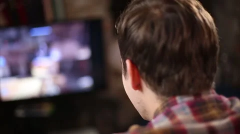 Gamer Captivated by Online Video Games Stock Footage