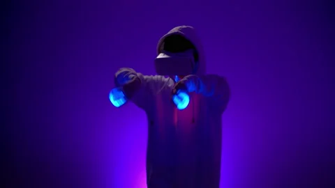 Gamer experiences VR-style technology while playing game Stock Footage 154767841