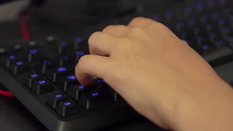 Gamer hand on keyboard Stock Footage 78265097