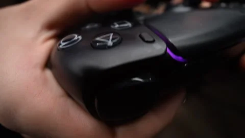 Gamer hand on video controller, highlighting fun and technology Stock Footage 319141227