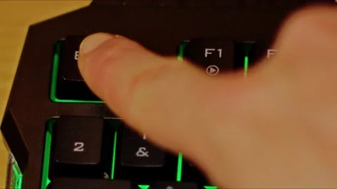 Gamer Pc Keyboard  Right Hand Finger Pushing the ESC Escape Button Top Shot  Stock Footage 231072798