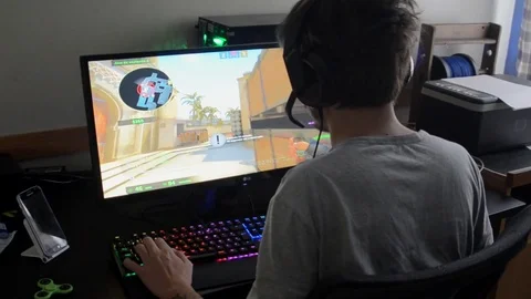 Gamer playing game Stock Footage 80502818